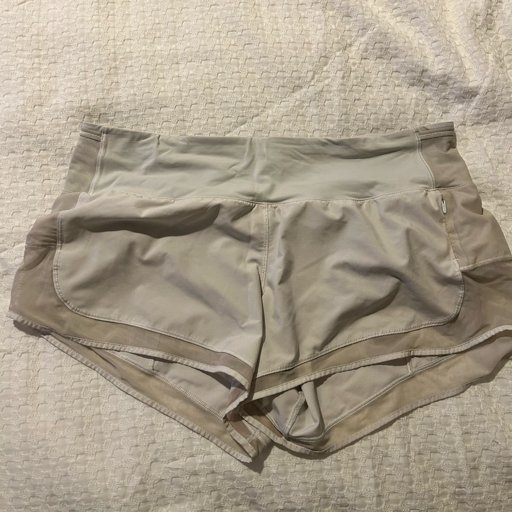 Cream Lululemon shorts